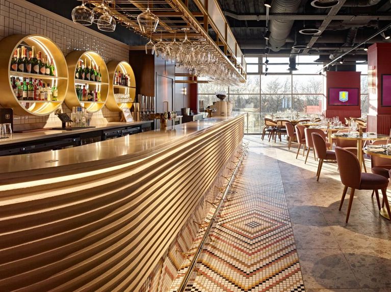 Modern bar with light streaming in through the windows