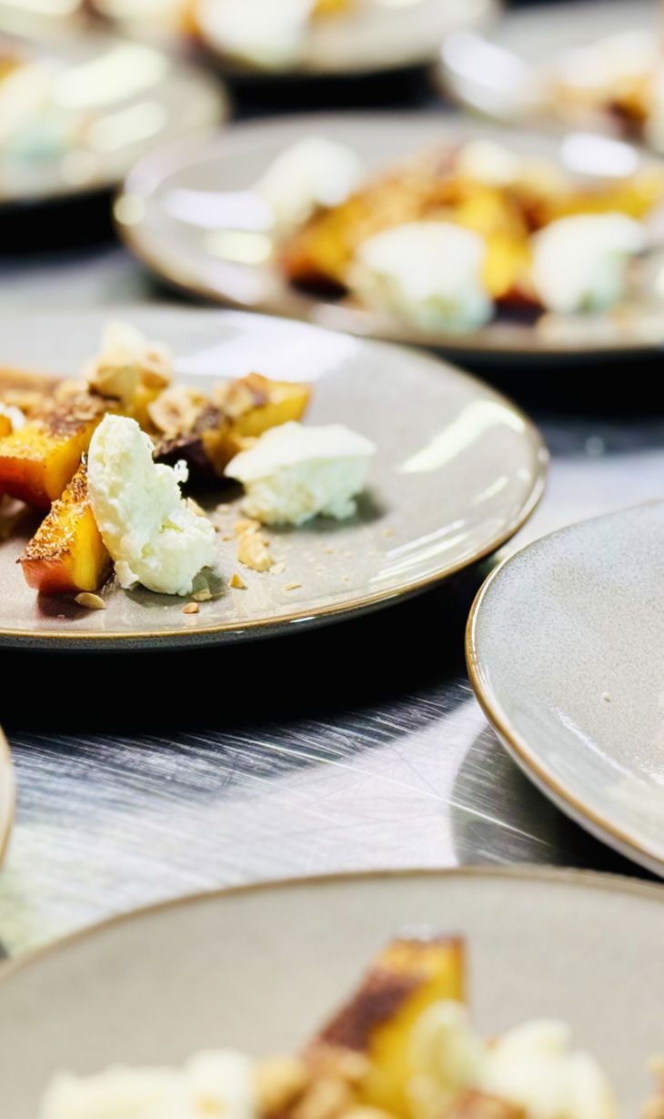 Beautifully plated food in commercial kitchen